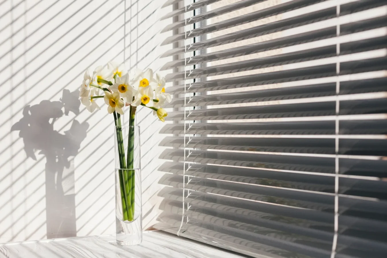 Home window shutters with flowers styled by window fitters near me